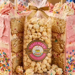 Popcorn cake with 'Happy Birthday' banner and Hatchers Popcorn Company logo.