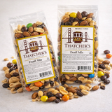 Two packages of Thatcher's Trail Mix on a light background
